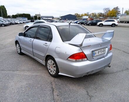 Сірий Міцубісі Lancer, об'ємом двигуна 1.6 л та пробігом 300 тис. км за 2999 $, фото 5 на Automoto.ua