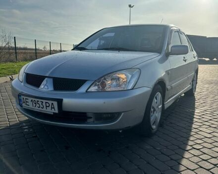 Серый Мицубиси Лансер, объемом двигателя 1.6 л и пробегом 170 тыс. км за 3700 $, фото 1 на Automoto.ua