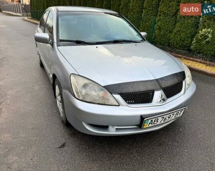 Сірий Міцубісі Lancer, об'ємом двигуна 1.58 л та пробігом 333 тис. км за 2999 $, фото 3 на Automoto.ua