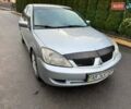Сірий Міцубісі Lancer, об'ємом двигуна 1.58 л та пробігом 333 тис. км за 2999 $, фото 3 на Automoto.ua