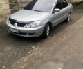 Сірий Міцубісі Lancer, об'ємом двигуна 1.58 л та пробігом 276 тис. км за 5000 $, фото 1 на Automoto.ua