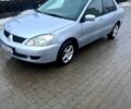 Сірий Міцубісі Lancer, об'ємом двигуна 1.6 л та пробігом 245 тис. км за 3000 $, фото 1 на Automoto.ua