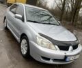 Сірий Міцубісі Lancer, об'ємом двигуна 1.6 л та пробігом 229 тис. км за 4300 $, фото 1 на Automoto.ua