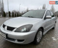 Сірий Міцубісі Lancer, об'ємом двигуна 1.6 л та пробігом 208 тис. км за 4300 $, фото 1 на Automoto.ua