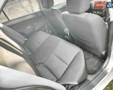 Серый Мицубиси Лансер, объемом двигателя 1.6 л и пробегом 234 тыс. км за 4300 $, фото 5 на Automoto.ua