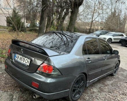Сірий Міцубісі Lancer, об'ємом двигуна 2 л та пробігом 200 тис. км за 4999 $, фото 11 на Automoto.ua
