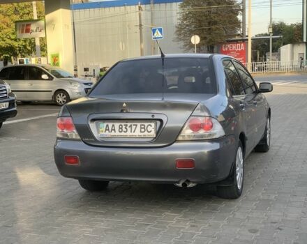 Сірий Міцубісі Lancer, об'ємом двигуна 1.6 л та пробігом 270 тис. км за 3800 $, фото 5 на Automoto.ua
