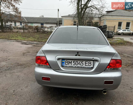 Сірий Міцубісі Lancer, об'ємом двигуна 1.58 л та пробігом 308 тис. км за 3700 $, фото 5 на Automoto.ua