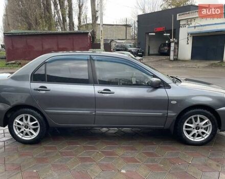 Сірий Міцубісі Lancer, об'ємом двигуна 1.6 л та пробігом 262 тис. км за 4400 $, фото 6 на Automoto.ua
