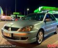 Сірий Міцубісі Lancer, об'ємом двигуна 2 л та пробігом 230 тис. км за 3700 $, фото 1 на Automoto.ua