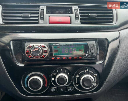 Сірий Міцубісі Lancer, об'ємом двигуна 1.58 л та пробігом 333 тис. км за 2999 $, фото 11 на Automoto.ua