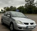 Сірий Міцубісі Lancer, об'ємом двигуна 1.6 л та пробігом 274 тис. км за 2690 $, фото 1 на Automoto.ua