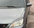 Сірий Міцубісі Lancer, об'ємом двигуна 1.58 л та пробігом 220 тис. км за 4300 $, фото 1 на Automoto.ua
