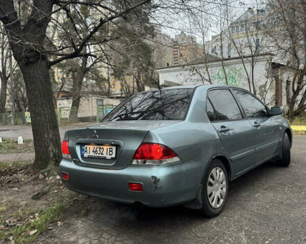 Сірий Міцубісі Lancer, об'ємом двигуна 1.6 л та пробігом 240 тис. км за 3000 $, фото 4 на Automoto.ua
