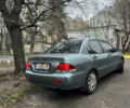 Сірий Міцубісі Lancer, об'ємом двигуна 1.6 л та пробігом 240 тис. км за 3000 $, фото 4 на Automoto.ua