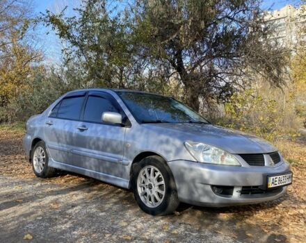 Серый Мицубиси Лансер, объемом двигателя 1.6 л и пробегом 204 тыс. км за 3999 $, фото 5 на Automoto.ua