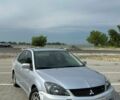 Сірий Міцубісі Lancer, об'ємом двигуна 2 л та пробігом 178 тис. км за 4200 $, фото 1 на Automoto.ua