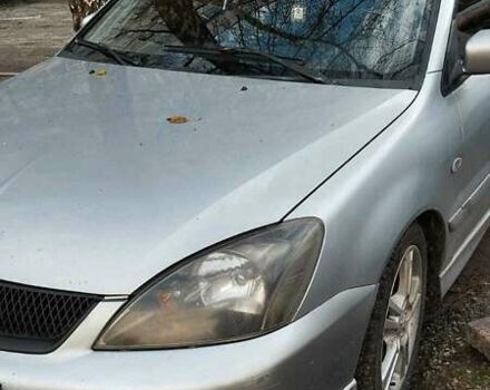 Серый Мицубиси Лансер, объемом двигателя 2 л и пробегом 284 тыс. км за 4100 $, фото 3 на Automoto.ua