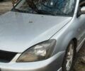 Серый Мицубиси Лансер, объемом двигателя 2 л и пробегом 284 тыс. км за 4100 $, фото 3 на Automoto.ua