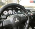 Серый Мицубиси Лансер, объемом двигателя 1.6 л и пробегом 234 тыс. км за 4300 $, фото 1 на Automoto.ua