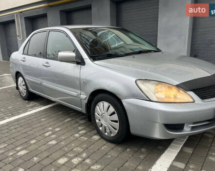 Сірий Міцубісі Lancer, об'ємом двигуна 1.58 л та пробігом 333 тис. км за 2999 $, фото 2 на Automoto.ua