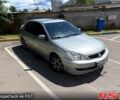 Сірий Міцубісі Lancer, об'ємом двигуна 2 л та пробігом 315 тис. км за 4600 $, фото 1 на Automoto.ua
