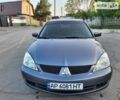 Сірий Міцубісі Lancer, об'ємом двигуна 1.6 л та пробігом 218 тис. км за 5700 $, фото 20 на Automoto.ua