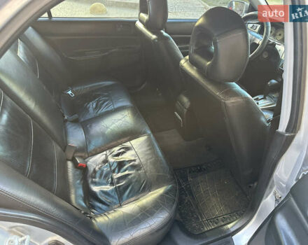 Серый Мицубиси Лансер, объемом двигателя 1.58 л и пробегом 244 тыс. км за 4950 $, фото 9 на Automoto.ua