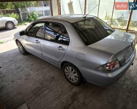 Сірий Міцубісі Lancer, об'ємом двигуна 1.58 л та пробігом 186 тис. км за 4300 $, фото 3 на Automoto.ua