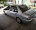 Сірий Міцубісі Lancer, об'ємом двигуна 1.58 л та пробігом 186 тис. км за 4300 $, фото 3 на Automoto.ua