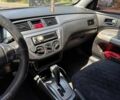 Серый Мицубиси Лансер, объемом двигателя 2 л и пробегом 260 тыс. км за 4500 $, фото 13 на Automoto.ua
