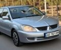 Серый Мицубиси Лансер, объемом двигателя 1.6 л и пробегом 255 тыс. км за 4650 $, фото 1 на Automoto.ua