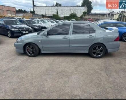 Сірий Міцубісі Lancer, об'ємом двигуна 2 л та пробігом 263 тис. км за 4300 $, фото 8 на Automoto.ua