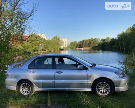 Сірий Міцубісі Lancer, об'ємом двигуна 2 л та пробігом 205 тис. км за 5500 $, фото 1 на Automoto.ua