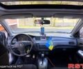 Серый Мицубиси Лансер, объемом двигателя 2 л и пробегом 250 тыс. км за 3500 $, фото 4 на Automoto.ua
