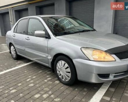 Серый Мицубиси Лансер, объемом двигателя 1.6 л и пробегом 333 тыс. км за 2800 $, фото 4 на Automoto.ua