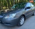 Сірий Міцубісі Lancer, об'ємом двигуна 1.3 л та пробігом 232 тис. км за 4150 $, фото 1 на Automoto.ua
