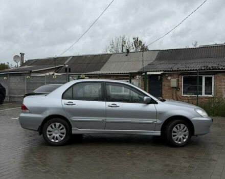Міцубісі Lancer 2006 у Житомирі на Automoto.ua Сірий Міцубісі Lancer, об'ємом двигуна 1.58 л та пробігом 195 тис. км за 4999 $, фото 2 на Automoto.ua