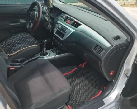 Серый Мицубиси Лансер, объемом двигателя 2 л и пробегом 306 тыс. км за 4100 $, фото 2 на Automoto.ua