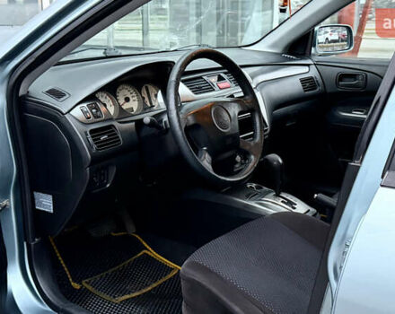 Сірий Міцубісі Lancer, об'ємом двигуна 1.58 л та пробігом 275 тис. км за 4600 $, фото 14 на Automoto.ua
