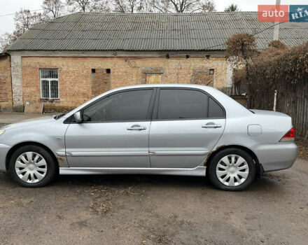 Сірий Міцубісі Lancer, об'ємом двигуна 1.58 л та пробігом 308 тис. км за 3700 $, фото 3 на Automoto.ua