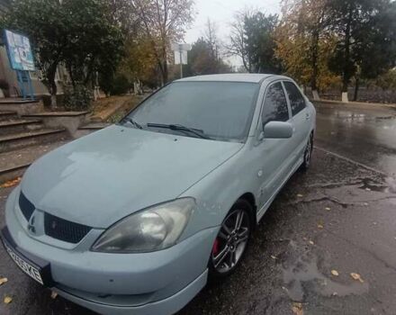 Сірий Міцубісі Lancer, об'ємом двигуна 2 л та пробігом 263 тис. км за 4300 $, фото 4 на Automoto.ua