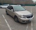 Сірий Міцубісі Lancer, об'ємом двигуна 2 л та пробігом 330 тис. км за 3450 $, фото 1 на Automoto.ua