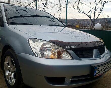 Сірий Міцубісі Lancer, об'ємом двигуна 1.6 л та пробігом 209 тис. км за 5200 $, фото 3 на Automoto.ua