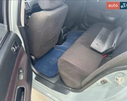 Сірий Міцубісі Lancer, об'ємом двигуна 2 л та пробігом 263 тис. км за 4300 $, фото 14 на Automoto.ua