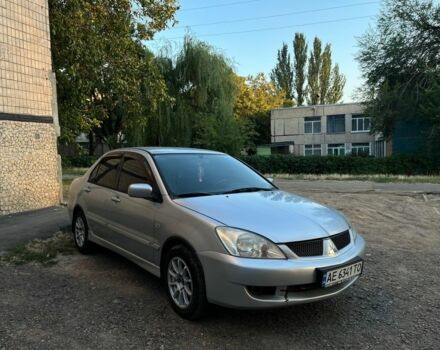 Серый Мицубиси Лансер, объемом двигателя 1.6 л и пробегом 225 тыс. км за 4700 $, фото 1 на Automoto.ua