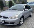 Сірий Міцубісі Lancer, об'ємом двигуна 0.16 л та пробігом 226 тис. км за 5400 $, фото 1 на Automoto.ua