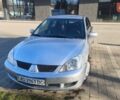Сірий Міцубісі Lancer, об'ємом двигуна 1.6 л та пробігом 206 тис. км за 3800 $, фото 1 на Automoto.ua
