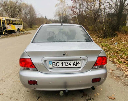 Серый Мицубиси Лансер, объемом двигателя 1.6 л и пробегом 253 тыс. км за 2850 $, фото 11 на Automoto.ua