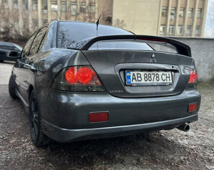 Сірий Міцубісі Lancer, об'ємом двигуна 2 л та пробігом 200 тис. км за 4999 $, фото 8 на Automoto.ua